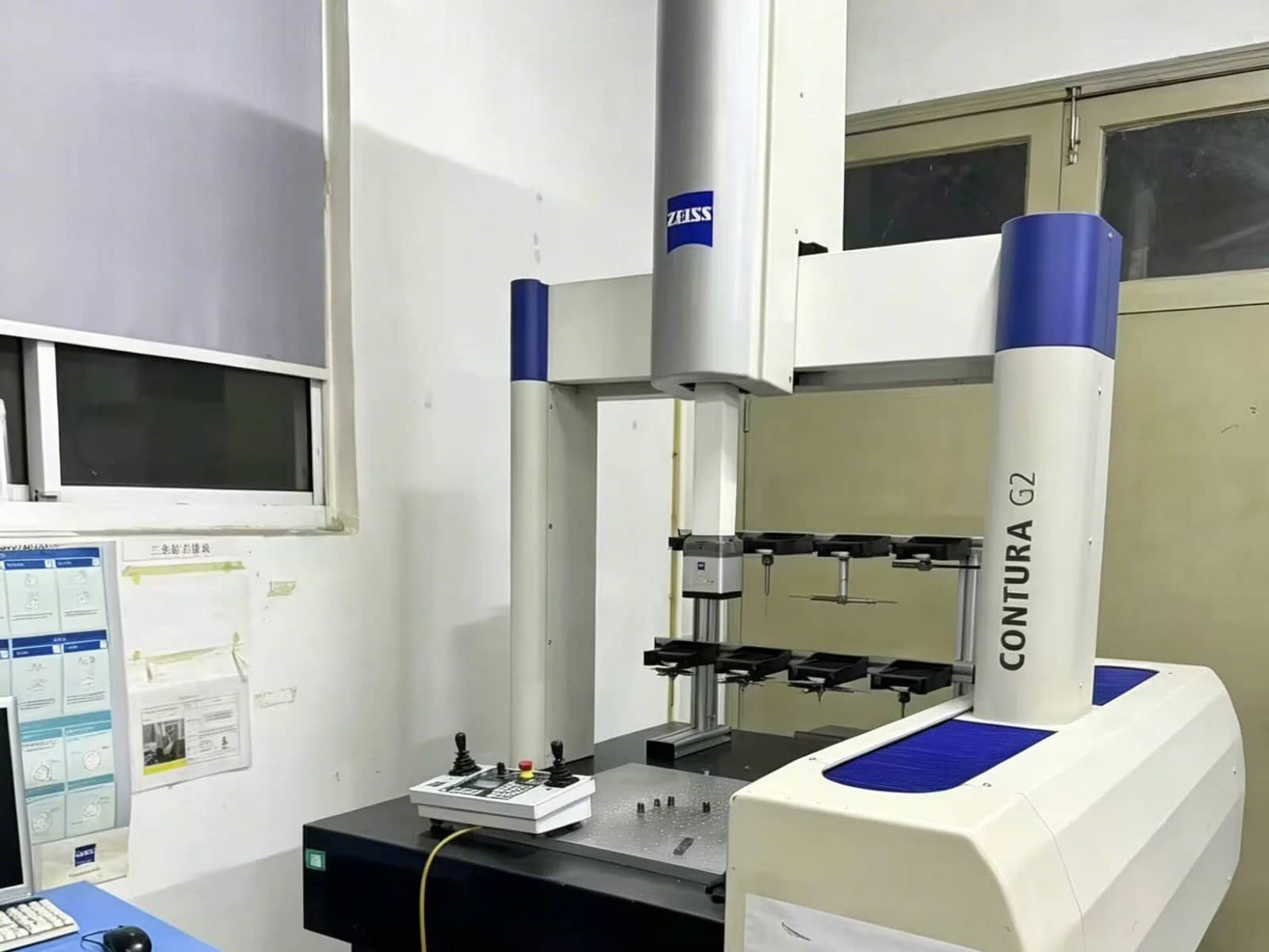 ZEISS bridge-type CMM with probe rack and metrology workstation in the inspection lab